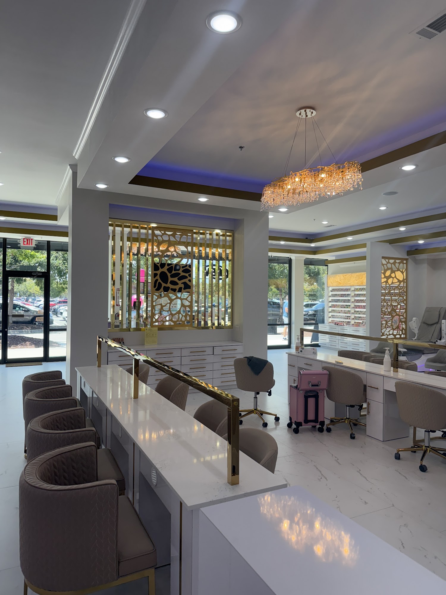 Luxia Mount Pleasant interior with gold accents and crystal chandelier